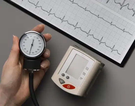 person using tensiometer blood pressure